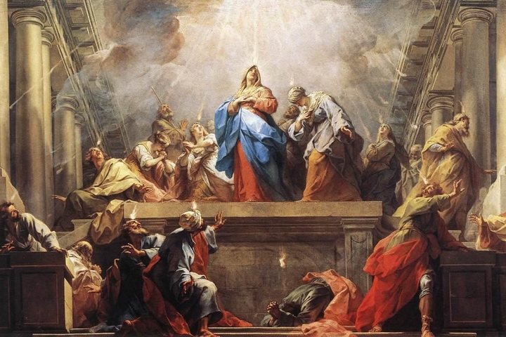 Tongues of fire descend on Mary and the apostles gathered in a great hall