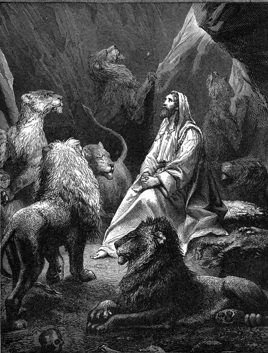 An engraving: Daniel sits on a rock in the lions' den in a long white robe, his hands folded and his face lifted to the light above. Lions lie and stand all around him, calm, one resting at his feet.