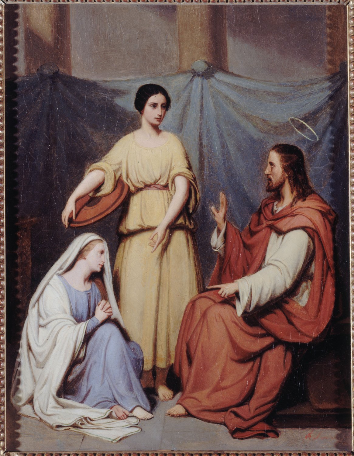Mary sitting on the floor in a white veil at Jesus' feet, while Martha stands over her holding a dish