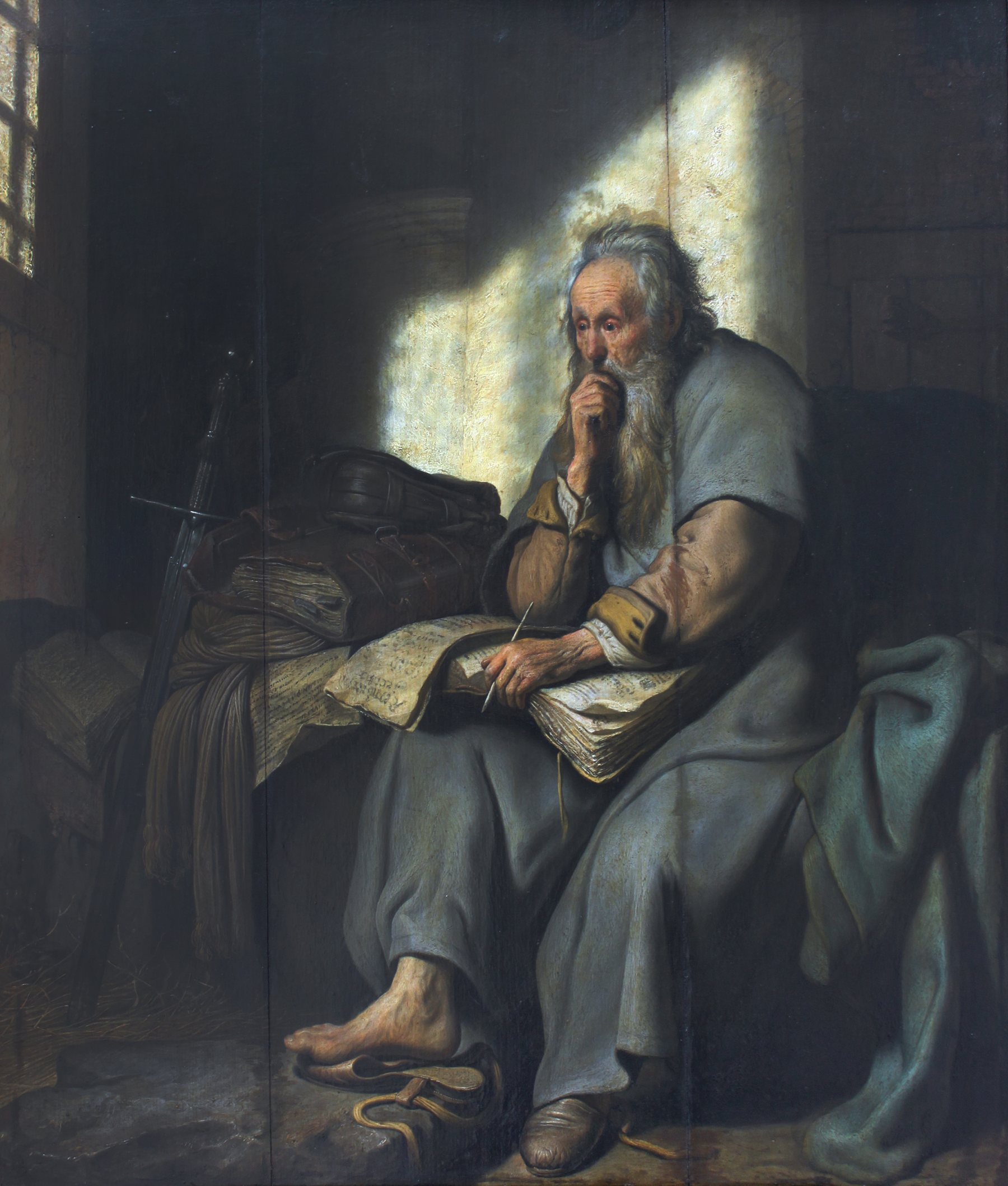 Rembrandt’s painting of the aged apostle Paul in his prison cell, pen in hand and letters on his knee, lit by a shaft of light from the window