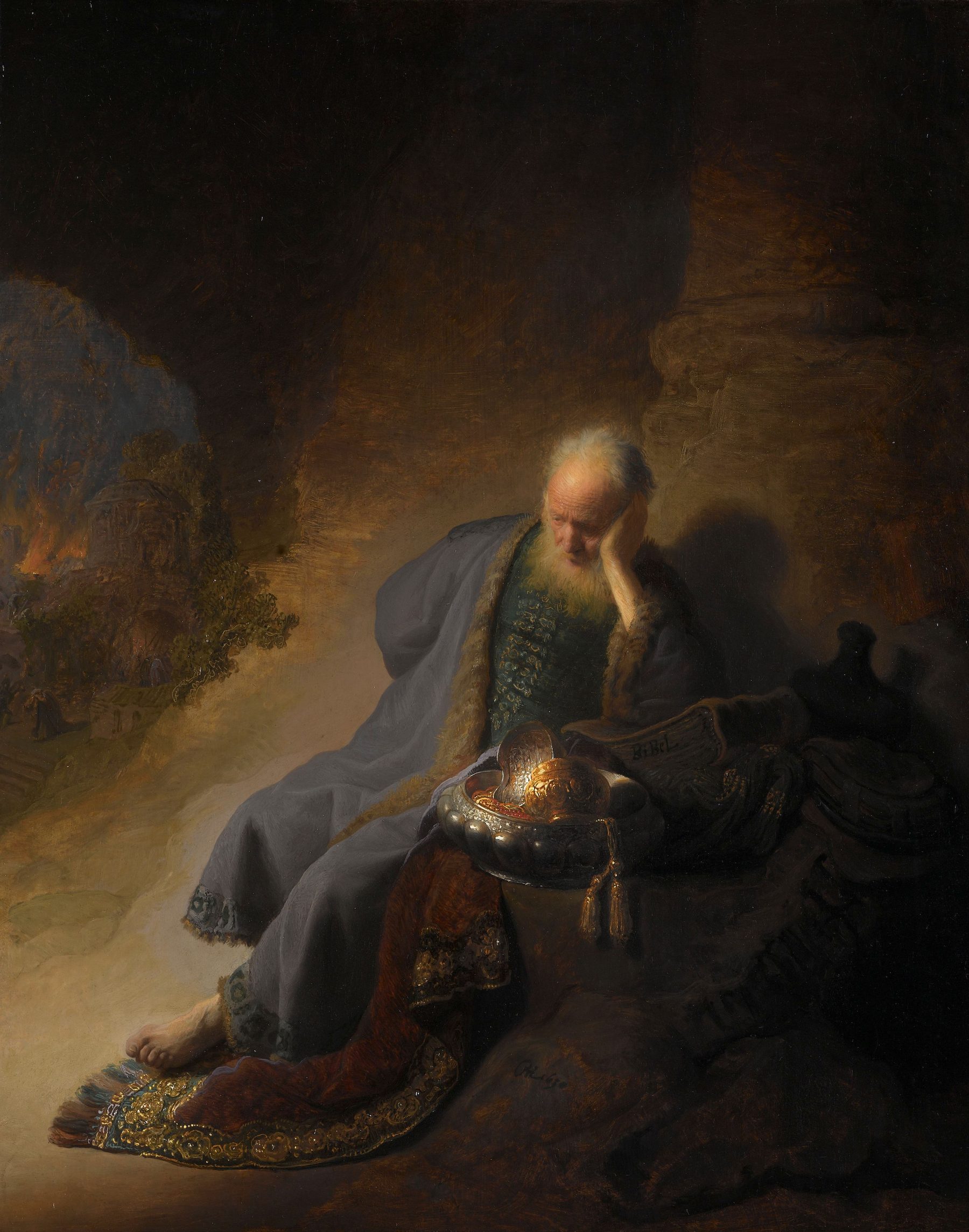 Rembrandt’s painting of the old prophet Jeremiah resting his head on his hand in a cave while Jerusalem burns in the distance