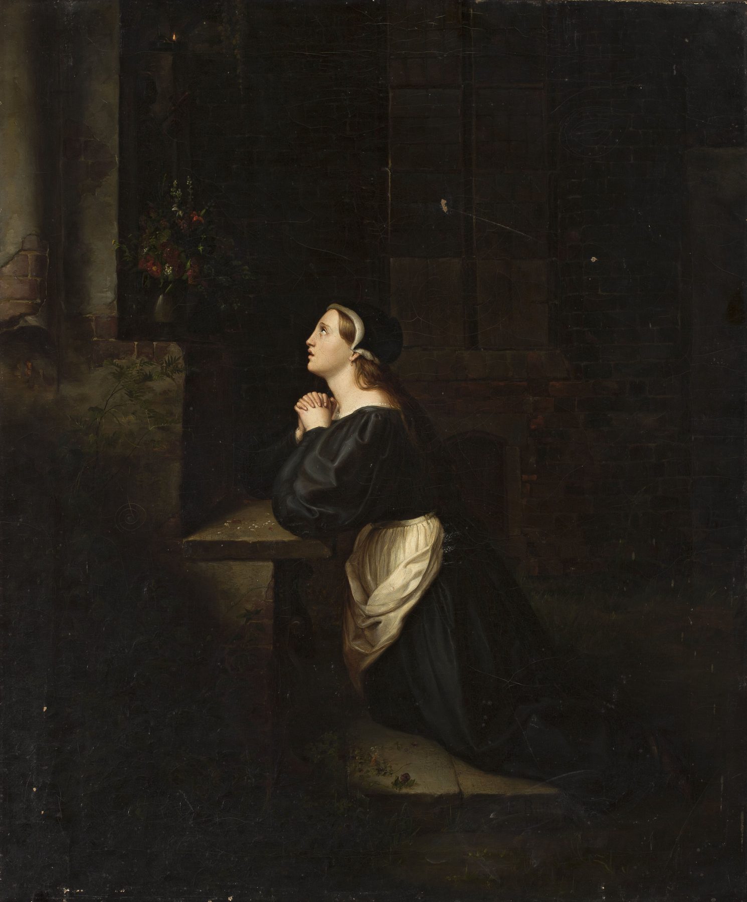 Eduard Ratti’s Prayer: a young woman kneels at a stone sill with her hands folded and her face lifted to the light
