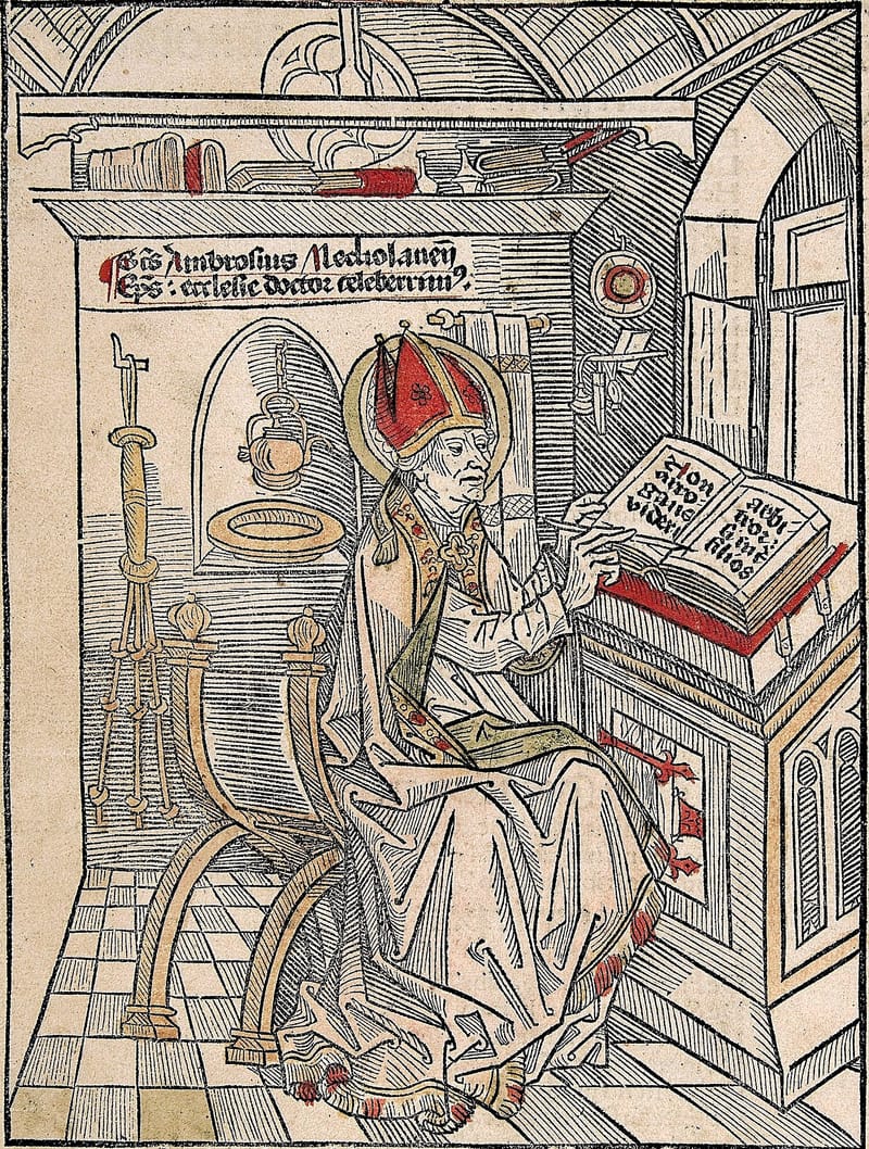 A hand-coloured woodcut: Ambrose, old and haloed, in a red mitre, sits in a carved chair in his study and writes in a large book on a desk. Books and jars stand on the shelf above him, a window is open on the right, and a Latin label names him bishop of Milan.