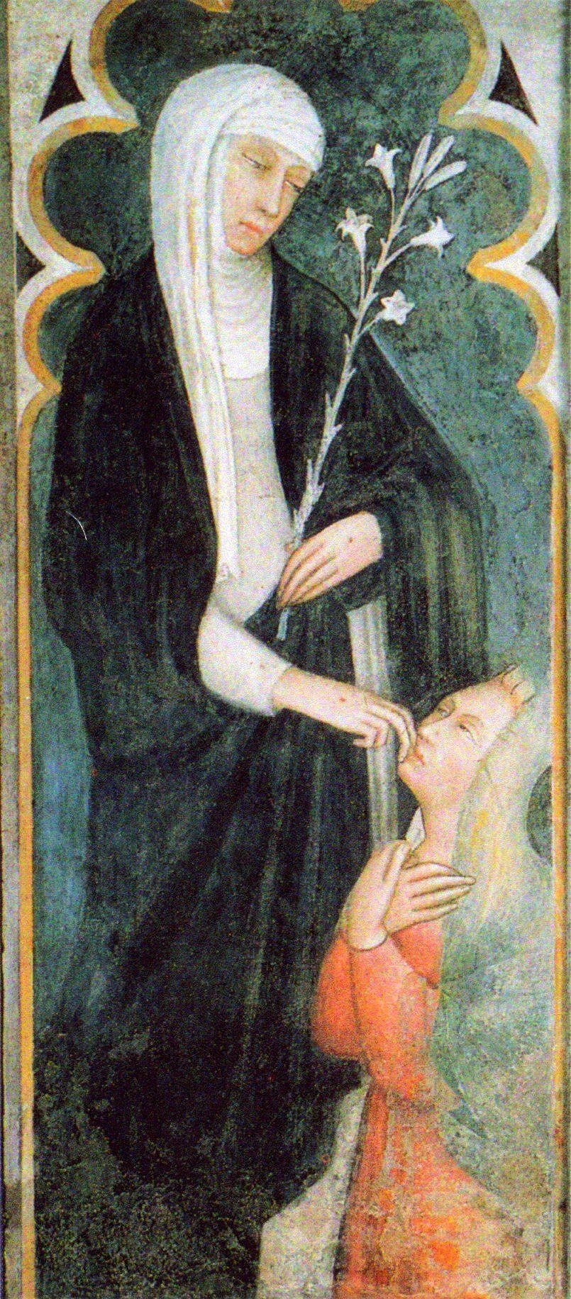 A fresco: Catherine in a white veil and wimple and a black mantle over a white habit, her head bowed, holding a tall stem of white lilies, before a dark green ground in a painted Gothic frame