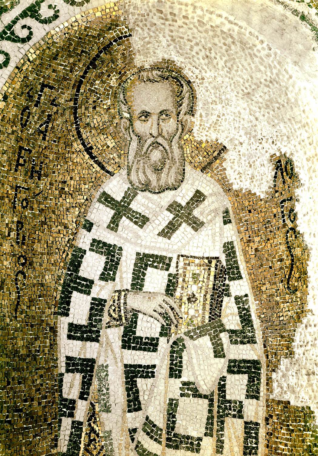 A Byzantine mosaic on gold: Gregory, with a high forehead and a long grey beard, in a white stole with black crosses, holds a jewelled Gospel book, his name in Greek beside him