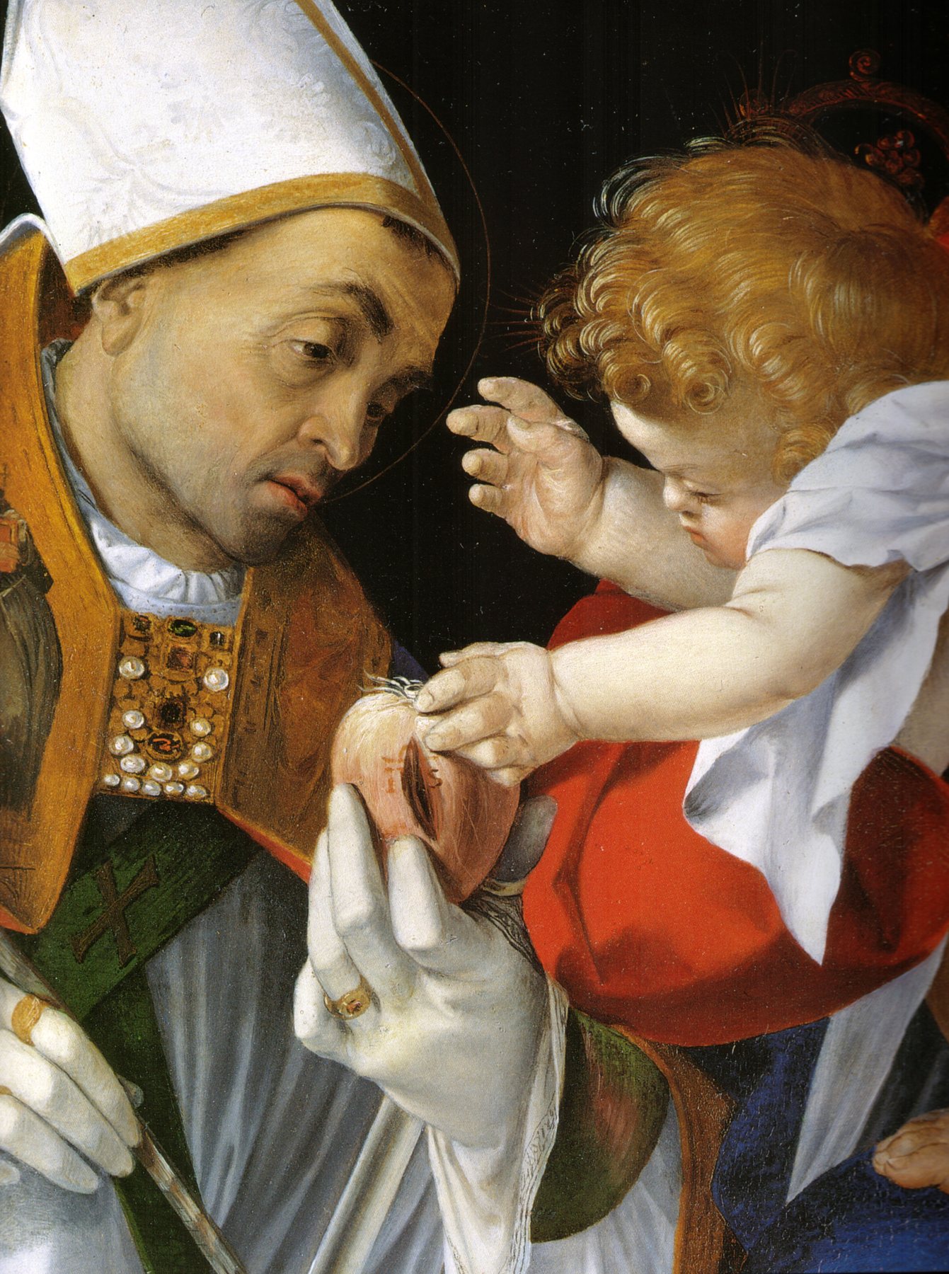A Renaissance painting: Saint Ignatius, a dark-eyed bishop in a tall white mitre and a jewelled gold cope, bends his head toward a curly-haired Christ Child in red, Who reaches down to touch a small red heart held in the bishop's white-gloved hand