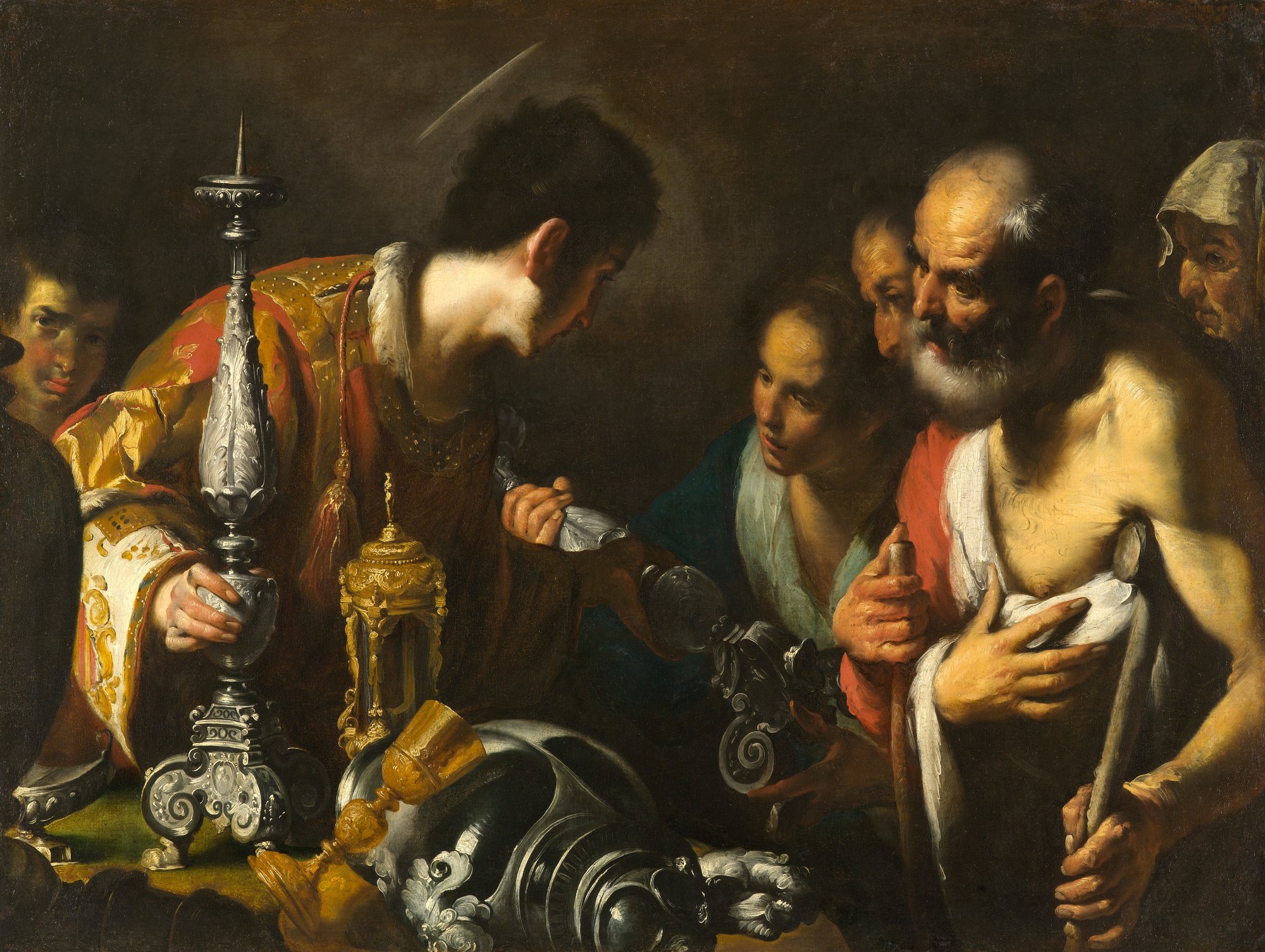 A painting by Bernardo Strozzi: the young deacon Lawrence, haloed, in a gold vestment, holds out a tall silver candlestick and the Church’s gold and silver vessels to the poor who crowd in at the right: a bare-chested old man on a crutch, a young woman and others behind them