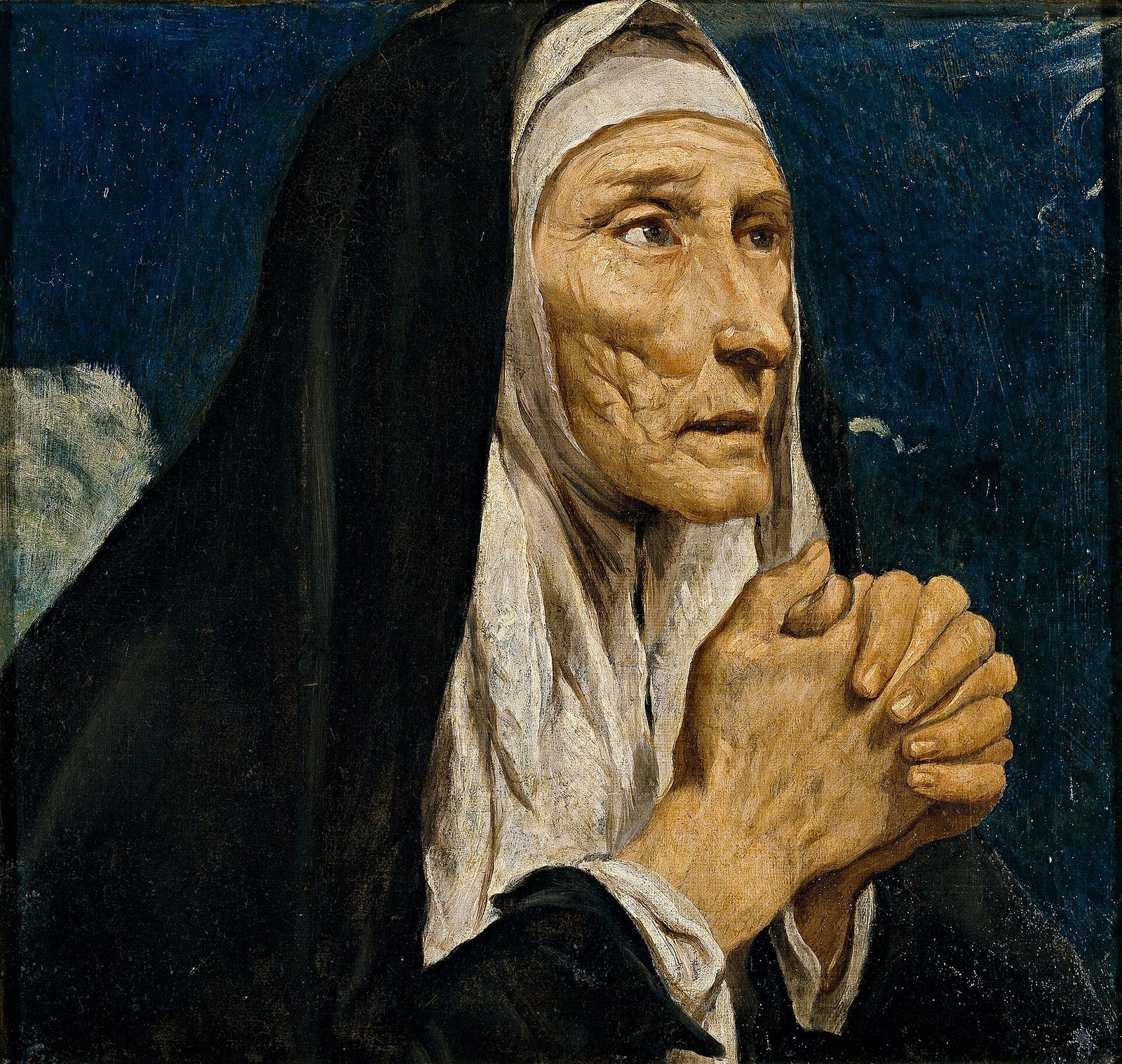 An old woman in a black veil over a white wimple lifts her lined face, her eyes wet, and clasps her hands in prayer against a dark blue sky